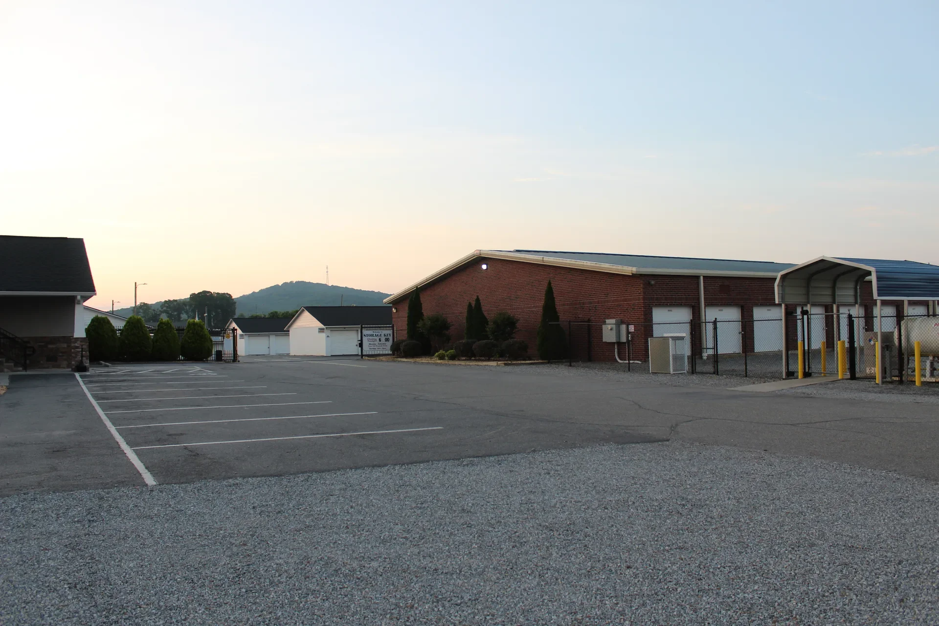 The covered propane refill canopy and tank beside the climate-controlled building at The Storage Key on Highway 411 in Cartersville.